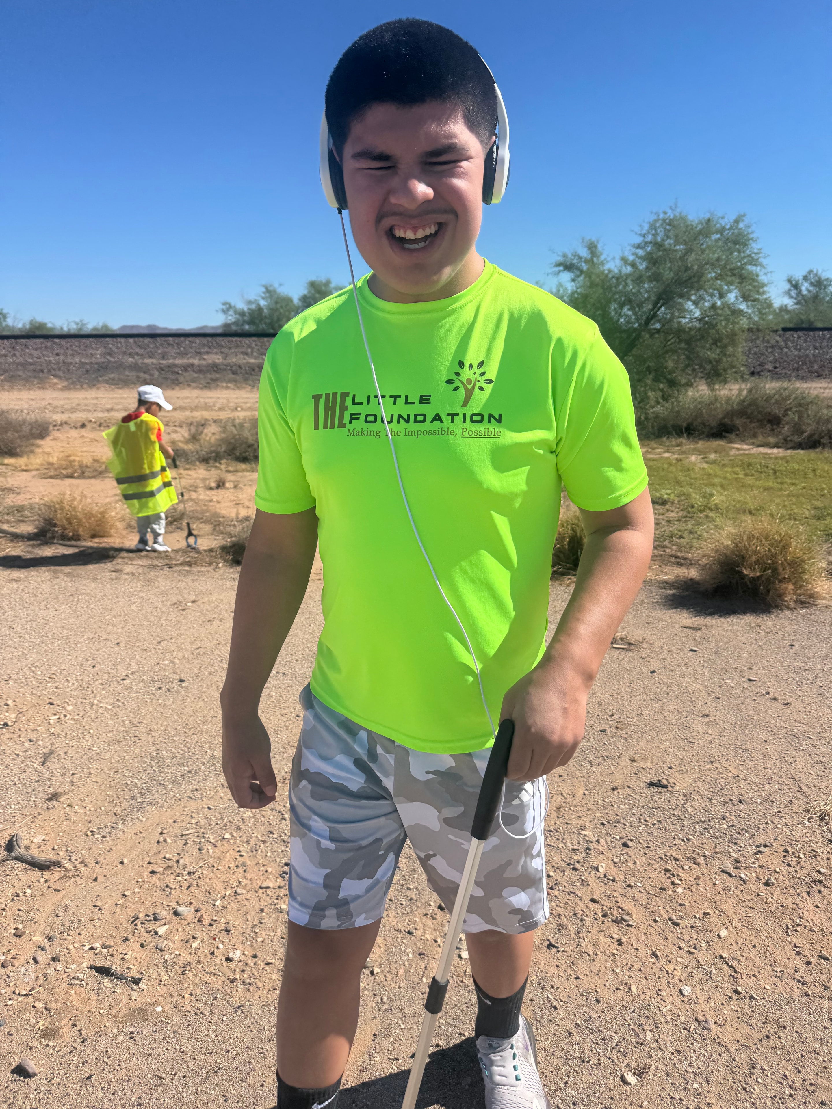 Little Foundation participant smiling during National Clean Up Day